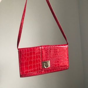 Hot pink/ redish small shoulder bag.